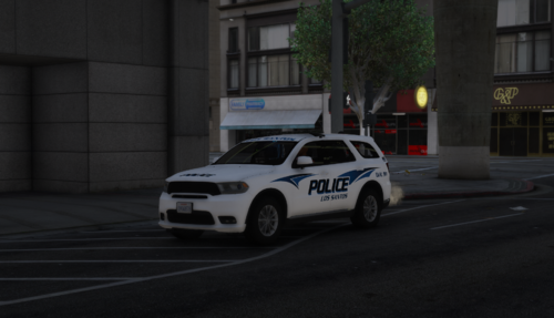 Could contain: vehicle, land vehicle, wheel, outdoor, road, building, tire, transport, car, street, police, auto part, mid-size car, police car, full-size car