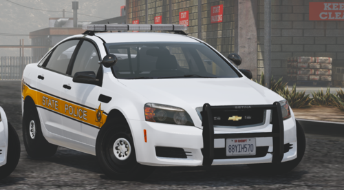 Could contain: land vehicle, vehicle, wheel, tire, text, vehicle registration plate, auto part, outdoor, police car, law enforcement, full-size car, police, bumper, car, street