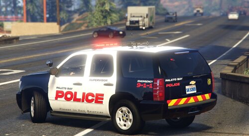 Could contain: vehicle, land vehicle, wheel, text, outdoor, road, transport, tire, vehicle registration plate, car, mode of transport, street, motor vehicle, auto part, emergency service, police car, emergency vehicle, automotive exterior, law enforcement, police, driving, emergency, van