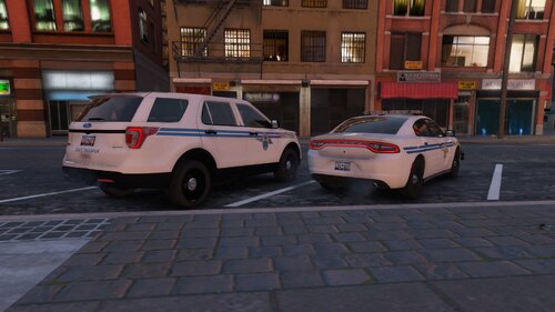 Could contain: vehicle, land vehicle, wheel, outdoor, building, car, transport, tire, automotive exterior, road, street, vehicle registration plate, parked, police