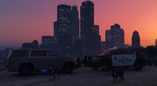 Could contain: land vehicle, vehicle, outdoor, wheel, sky, sunset, car, skyscraper, transport, van, tire, building, downtown, city, sunrise, ground, street, parked, skyline