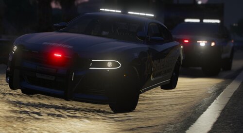 Could contain: vehicle, land vehicle, wheel, tire, outdoor, automotive design, luxury vehicle, ground, sports car, road, sports sedan, automotive lighting, auto part, performance car, transport, car, dark, night, street, light