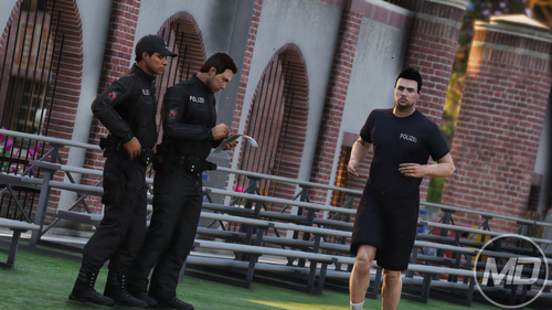 Could contain: person, clothing, building, grass, outdoor, man, standing, wheel, people