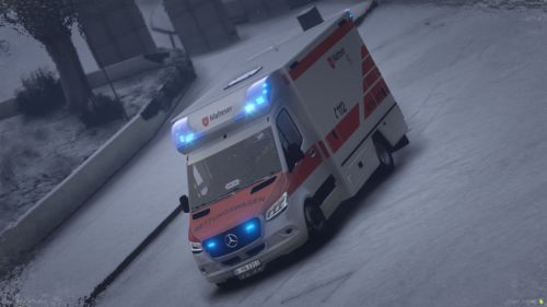 Could contain: vehicle, land vehicle, outdoor, transport, wheel, snow, winter, text, road, street, ambulance, light