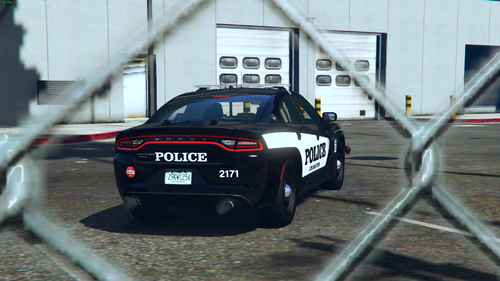 Could contain: vehicle, land vehicle, wheel, tire, outdoor, auto part, building, text, mid-size car, automotive design, sports sedan, motorsport, sports car, automotive exterior, performance car, ground, rally, police, car, racing