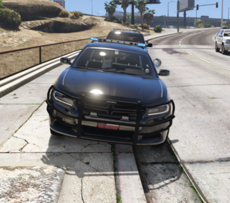 Could contain: outdoor, vehicle, land vehicle, ground, wheel, tire, road, bumper, automotive design, auto part, hood, vehicle registration plate, automotive exterior, grille, street, car, parked