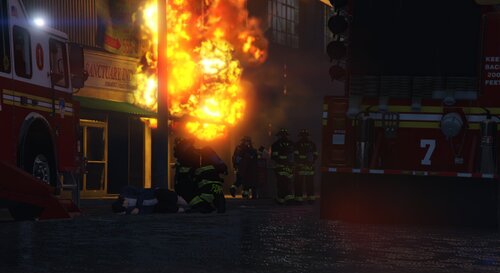 Could contain: firefighter, outdoor, fire, heat, building, explosion, smoke, pollution, night, ground, street, city