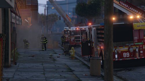 Could contain: firefighter, outdoor, fire, building, emergency service, fire department, vehicle, emergency, fire apparatus, street, city, ground