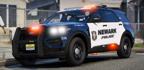 Could contain: vehicle, land vehicle, wheel, tire, police, outdoor, text, auto part, road, bumper, police car, automotive design, automotive exterior, car, motor vehicle, nissan, ford, transport, street, rally