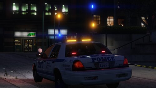 Could contain: vehicle, land vehicle, transport, outdoor, wheel, text, building, road, car, ford crown victoria police interceptor, tire, police car, police, vehicle registration plate, street, full-size car, law enforcement, light, night