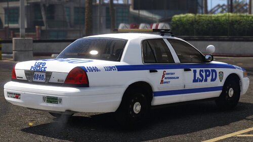 Could contain: vehicle, land vehicle, text, wheel, transport, outdoor, police car, vehicle registration plate, law enforcement, full-size car, car, ford crown victoria police interceptor, tire, sedan, road, ford, police, street