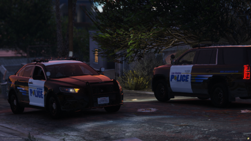 Could contain: vehicle, outdoor, land vehicle, wheel, tire, tree, text, vehicle registration plate, transport, auto part, road, street, automotive exterior, automotive tail & brake light, car, police, ground, light