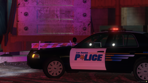 Could contain: vehicle, land vehicle, wheel, transport, tire, building, text, car, outdoor, street, parked, light, purple, night, police