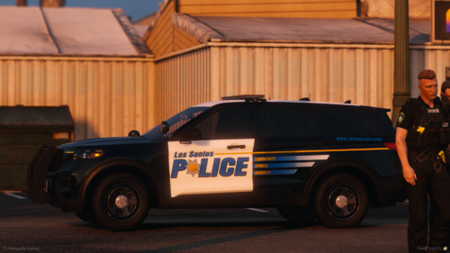 Could contain: vehicle, land vehicle, wheel, clothing, outdoor, tire, law enforcement, building, transport, person, police, police car, car, officer, street, van