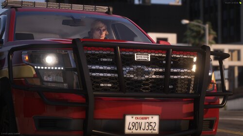 Could contain: vehicle, land vehicle, text, wheel, tire, auto part, automotive design, bumper, automotive exterior, red, car, motor vehicle, outdoor, road, truck, person, driving, street