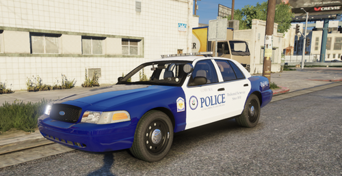 Could contain: vehicle, land vehicle, wheel, outdoor, text, transport, tire, road, car, vehicle registration plate, police car, full-size car, ford crown victoria police interceptor, police, law enforcement, blue, street, parked
