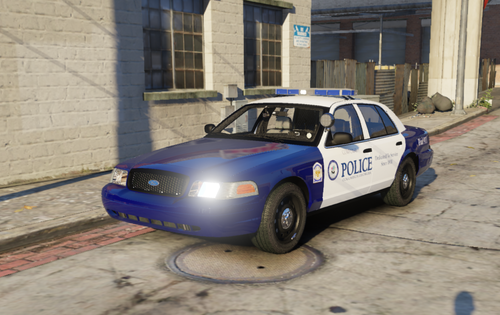 Could contain: vehicle, land vehicle, wheel, outdoor, tire, transport, building, ground, car, road, auto part, blue, street, rally, parked