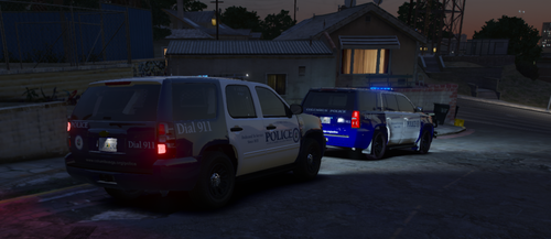 Could contain: vehicle, land vehicle, outdoor, wheel, transport, tire, vehicle registration plate, automotive tail & brake light, building, road, auto part, motor vehicle, automotive exterior, minivan, text, automotive lighting, sport utility vehicle, automotive parking light, van, police, street, car, parked, light