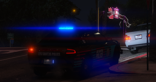 Could contain: vehicle, land vehicle, text, outdoor, road, car, automotive tail & brake light, wheel, night, street, light