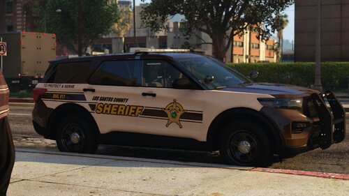 Could contain: land vehicle, vehicle, wheel, outdoor, tire, law enforcement, transport, text, police car, auto part, sport utility vehicle, car, ford, automotive exterior, police, street