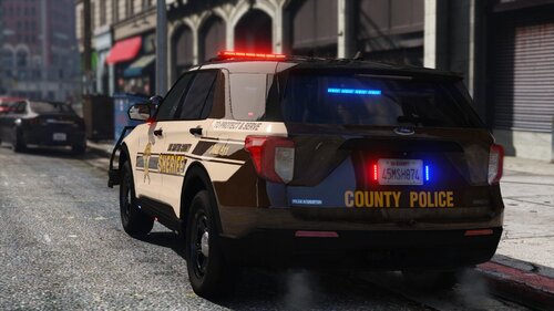 Could contain: vehicle, land vehicle, text, wheel, tire, transport, outdoor, building, vehicle registration plate, road, auto part, automotive exterior, street, automotive lighting, bumper, automotive tail & brake light, law enforcement, police car, automotive design, automotive parking light, police, car, light, driving