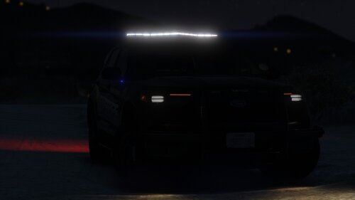 Could contain: vehicle, land vehicle, tire, light, car, automotive design, wheel, outdoor, auto part, automotive lighting, road, night, dark, ground