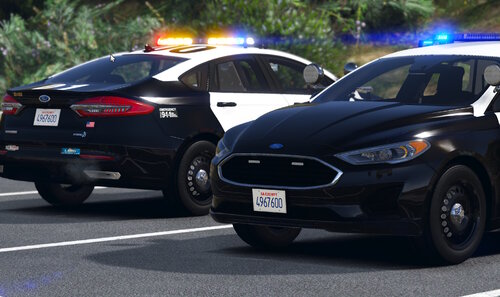 Could contain: vehicle, land vehicle, tire, wheel, outdoor, auto part, mid-size car, car, full-size car, bumper, automotive design, sports sedan, police, law enforcement, automotive lighting, police car, road