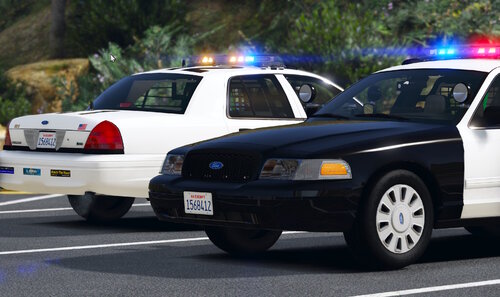 Could contain: vehicle, land vehicle, wheel, outdoor, tire, transport, ford crown victoria police interceptor, law enforcement, police car, auto part, bumper, full-size car, road, vehicle registration plate, automotive exterior, police, sedan, automotive side marker light, text, car