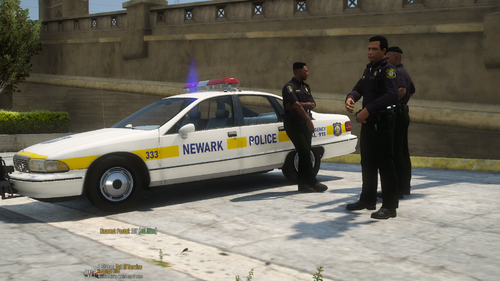 Could contain: vehicle, land vehicle, outdoor, transport, wheel, law enforcement, clothing, police car, ford crown victoria police interceptor, person, full-size car, emergency service, police, car, officer