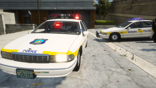 Could contain: vehicle, land vehicle, wheel, text, police, transport, car, outdoor, tire, vehicle registration plate, full-size car, police car, automotive parking light, emergency service, sedan, bumper, ford, emergency vehicle, ford crown victoria police interceptor, road, ground, parked, yellow, street, emergency