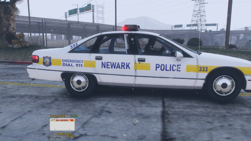 Could contain: vehicle, land vehicle, transport, text, wheel, outdoor, police car, law enforcement, police, emergency service, emergency vehicle, car, full-size car, ford crown victoria police interceptor, tire, emergency