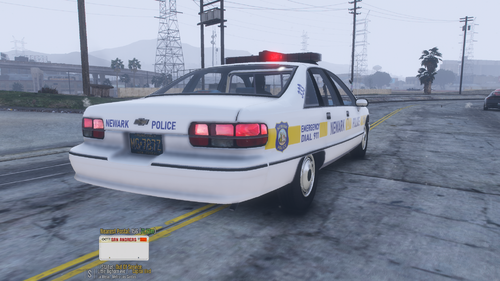 Could contain: vehicle, land vehicle, text, wheel, transport, outdoor, sky, vehicle registration plate, car, law enforcement, police car, tire, police, full-size car, emergency service, ford crown victoria police interceptor, road, ground