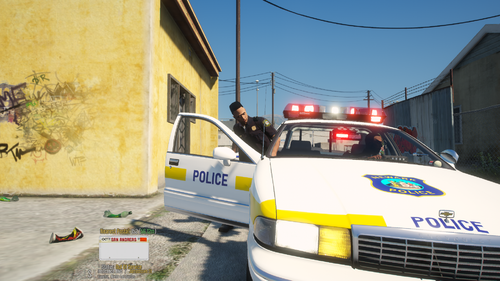 Could contain: vehicle, land vehicle, outdoor, text, sky, transport, building, emergency service, wheel, emergency vehicle, car, emergency, vehicle registration plate, ambulance, parked, police, yellow