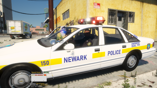 Could contain: vehicle, transport, land vehicle, wheel, text, car, police car, outdoor, law enforcement, police, emergency service, emergency vehicle, full-size car, tire, ford crown victoria police interceptor, emergency, police van, parked