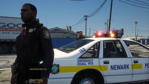 Could contain: vehicle, land vehicle, outdoor, sky, wheel, clothing, transport, person, text, law enforcement, police car, tire, emergency service, emergency vehicle, ford crown victoria police interceptor, car, police