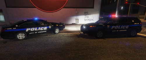 Could contain: land vehicle, vehicle, wheel, text, tire, transport, auto part, police car, law enforcement, full-size car, police, road, ford crown victoria police interceptor, emergency service, mid-size car, outdoor, car, light, street, ground, night