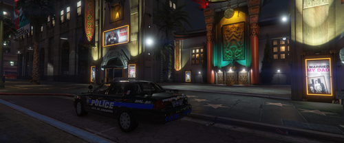 Could contain: vehicle, land vehicle, building, wheel, street, road, tire, outdoor, text, night, car, city, light