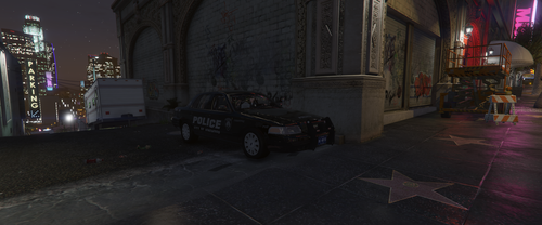 Could contain: vehicle, land vehicle, building, wheel, car, tire, outdoor, ground, street, city, night, light