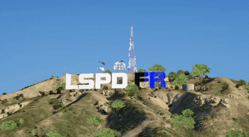 Could contain: outdoor, sky, tree, plant, tower, grass, hillside, landscape, blue, mountain