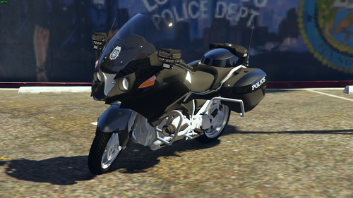 Could contain: tire, wheel, auto part, vehicle, ground, motorbike, land vehicle, fuel tank, motorcycle fairing, outdoor, automotive tire, motorcycle racing, vehicle brake, motorcycle helmet, motorcycling, road, motorcycle, parked, bike