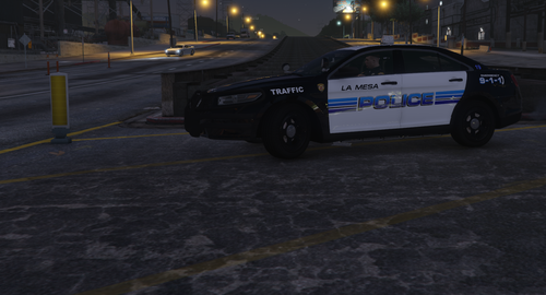 Could contain: vehicle, land vehicle, wheel, outdoor, road, tire, transport, text, street, police, car, night