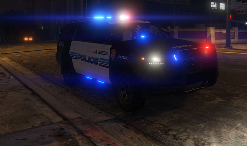 Could contain: vehicle, land vehicle, outdoor, wheel, text, tire, ground, automotive lighting, auto part, automotive tail & brake light, automotive exterior, road, transport, vehicle registration plate, light, night, street, police, parked, car