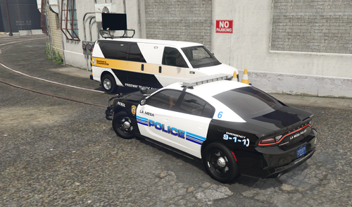 Could contain: vehicle, land vehicle, wheel, outdoor, tire, text, police car, building, road, motor vehicle, transport, auto part, automotive exterior, law enforcement, car, police, street, ground, emergency