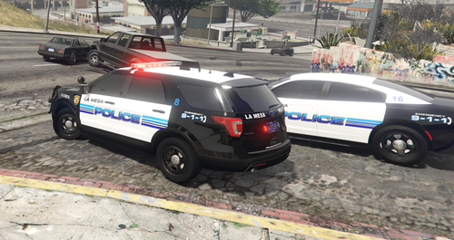 Could contain: vehicle, wheel, land vehicle, outdoor, tire, text, transport, law enforcement, police car, emergency service, police, auto part, emergency vehicle, motor vehicle, automotive exterior, car, vehicle registration plate, police van, road, street, emergency