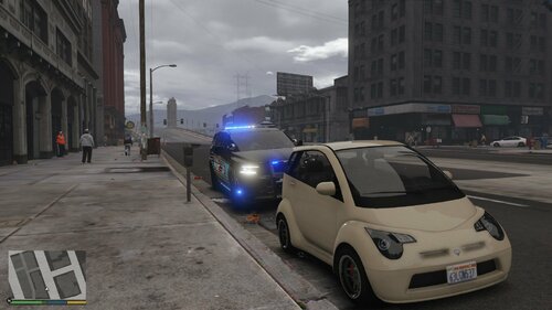 Could contain: land vehicle, vehicle, outdoor, wheel, building, sky, transport, road, city car, hatchback, car, subcompact car, street, compact car, tire, ground, parked, city, light