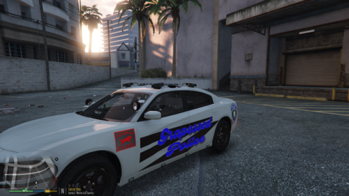 Could contain: vehicle, land vehicle, wheel, transport, outdoor, police car, mid-size car, full-size car, tire, sedan, sports sedan, road, auto part, law enforcement, police, car, street, city