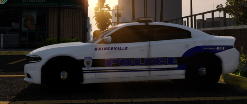 Could contain: vehicle, land vehicle, transport, wheel, outdoor, tire, police car, road, police, auto part, law enforcement, text, car, street