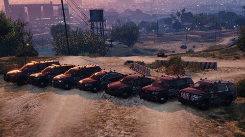 Could contain: land vehicle, outdoor, wheel, vehicle, tire, ground, tree, car, transport, mountain, military vehicle