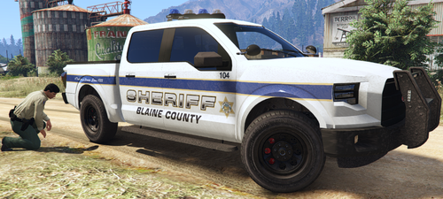 Could contain: outdoor, vehicle, tire, land vehicle, wheel, transport, truck, auto part, pickup truck, car, law enforcement, bumper, fender, automotive tire, automotive exterior, coupe utility, ground, police