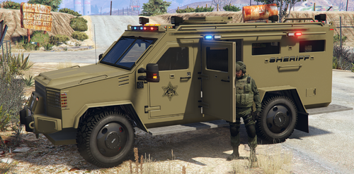 Could contain: vehicle, transport, land vehicle, wheel, outdoor, tire, military vehicle, humvee, armored car, auto part, combat vehicle, military, ground, parked, army